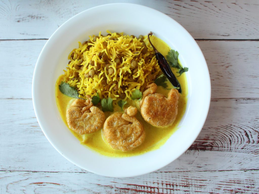 pakora curry on a plate with rice