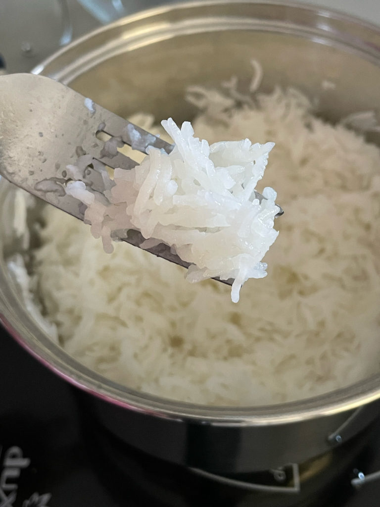 cooked rice on a fork for rajma chawal