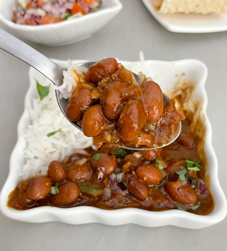 bite of rajma chawal on a spoon