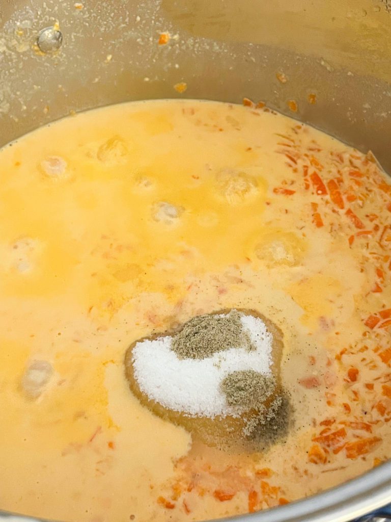 carrots, milk and sugar mixed together process for gajar ka halwa