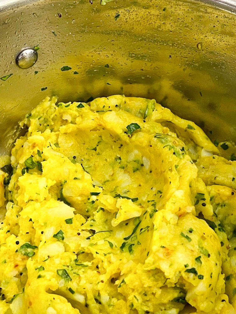 potatoes mixed with spices and herbs