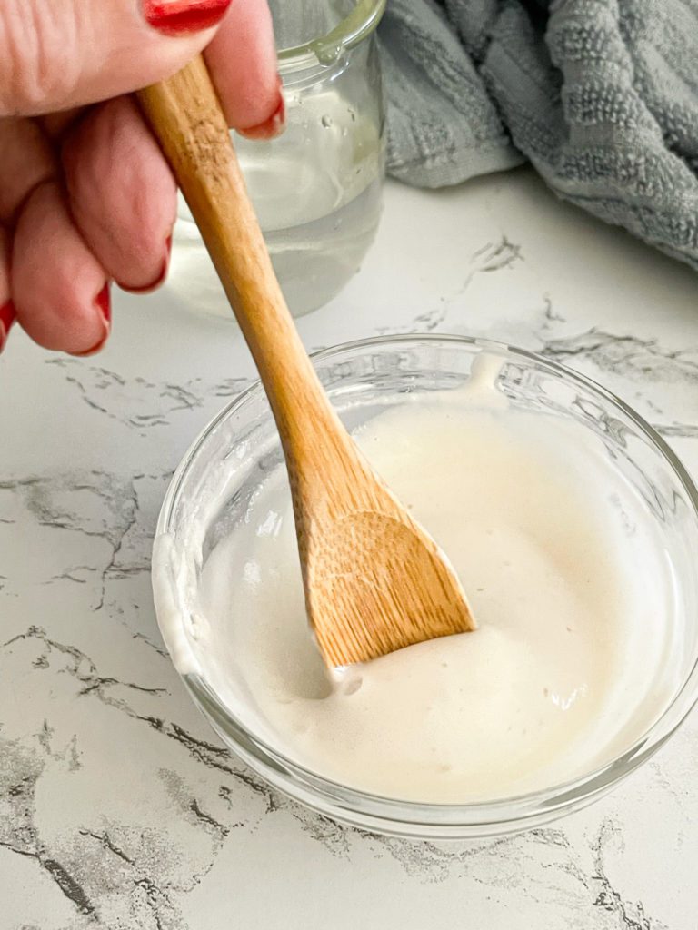 egg roll glue paste mixed with wooden spoon
