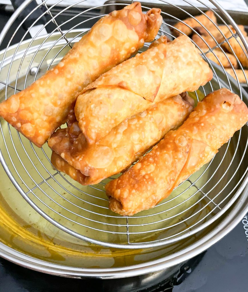 fried chicken egg rolls removed from oil